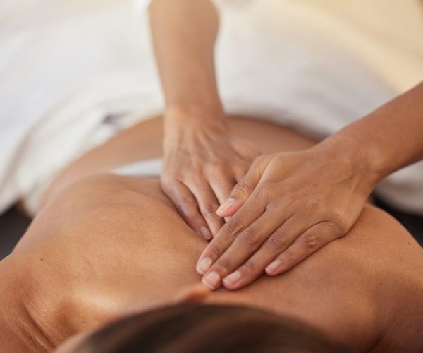 Woman at spa for massage with therapist and holistic treatment, wellness and self care with aromath